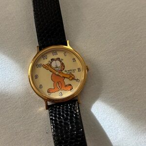 Armitron Gold and Black Watch with Cartoon Design